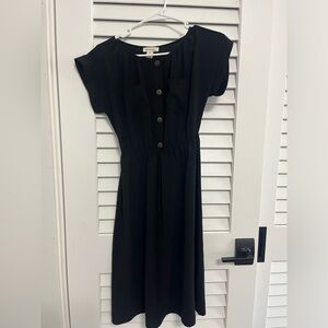 A black cap sleeved dress. Hardly worn!